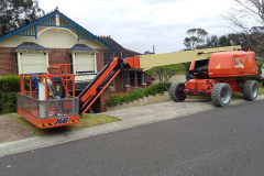 painting-house-with-cherry-picker